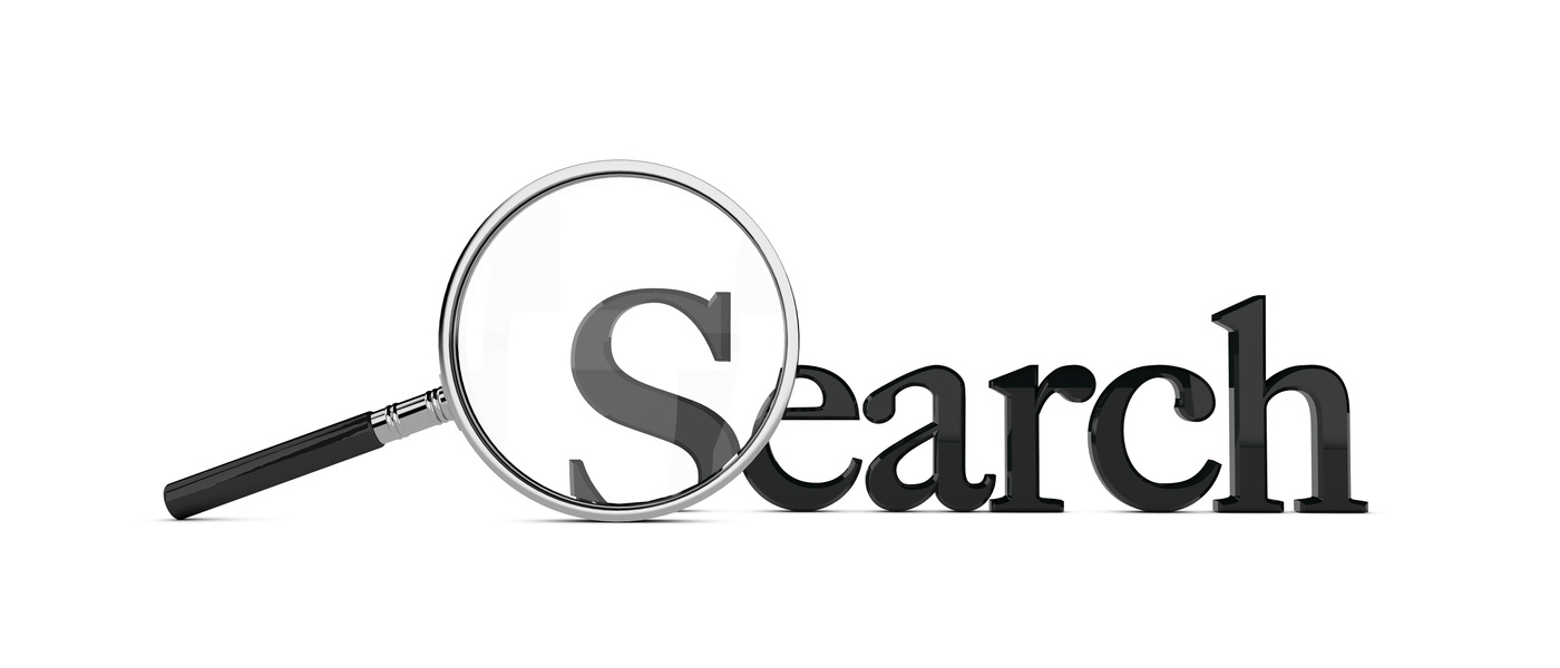 Magnifying glass over the word search